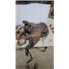 Image 2 : Vintage Tooled Leather Western Saddle, Draft Horse Collar, Wooden Stirrups, Harness, and More