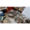Image 5 : Vintage Tooled Leather Western Saddle, Draft Horse Collar, Wooden Stirrups, Harness, and More