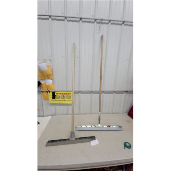 Two Industrial Floor Squeegees with Long Wooden Handles and Wide Metal Frames with Rubber Blades