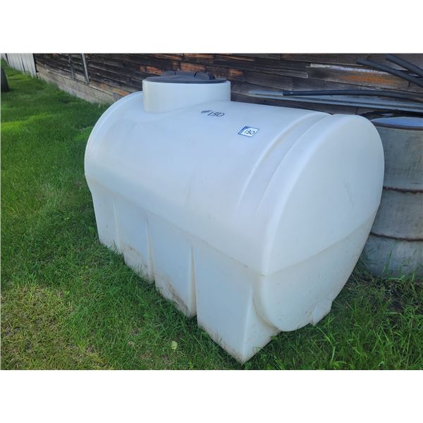 White poly tank, approx. 150 - 200 gal c/w valve