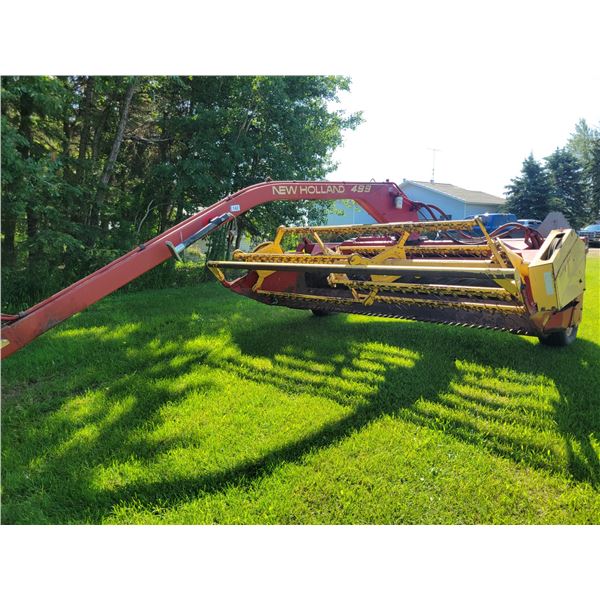 New Holland 499 Haybine. 12 ft. hydro swing, shedded, One owner, SN. 537382.