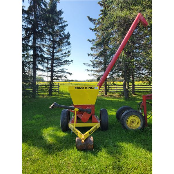 Farm King #180 PTO roller mill. Like new. One owner, shedded. SN 70629. Note: There is a roller mill