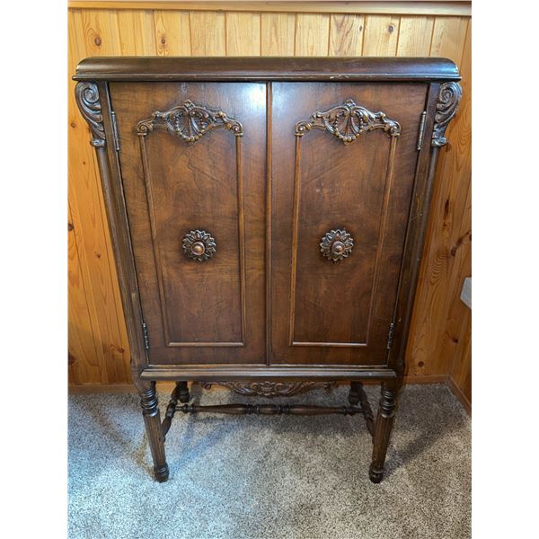 Carved Wood Two-Door Cabinet on Legs