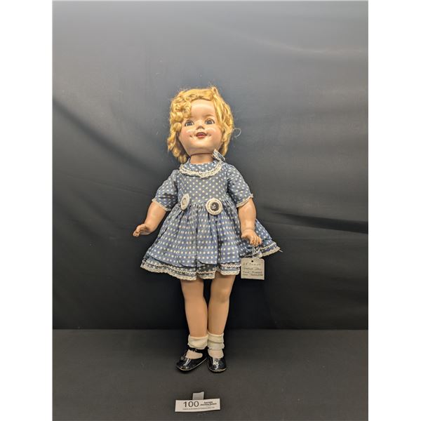 A 1930's  Shirley Temple Doll with 2 Pins Good Shape Face Has Been Repainted 23" Tall