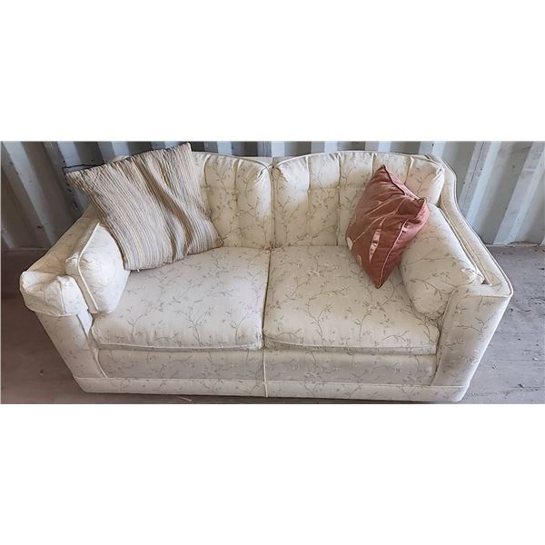 Two Seat Sofa with Beige Upholstery and Pastel Flowers