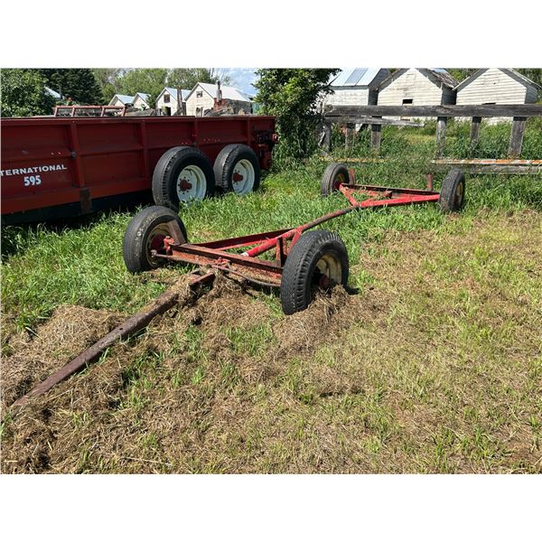 Red steel framed hay rack wagon