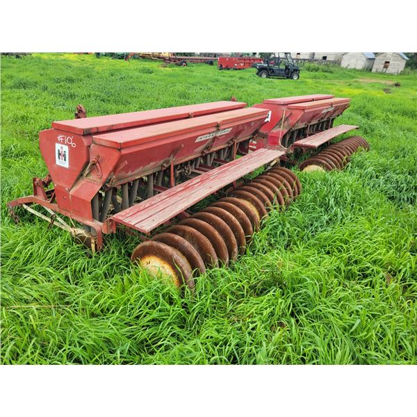 I.H 2- 8 ft drills c/w steel packers, All New Tires