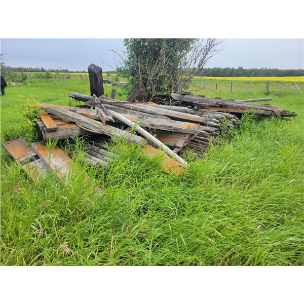 Pile of railroad ties & fence post