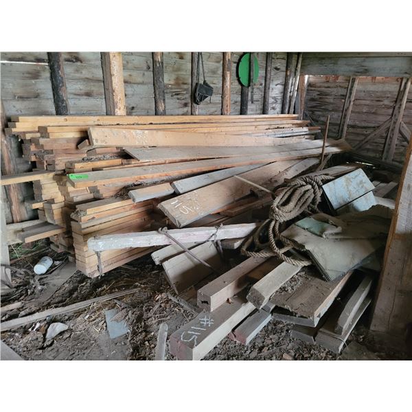 Qty of 2x6s, approx. 16 ft. & misc. wood in the NW corner