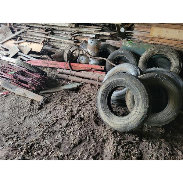 Feeder chain, harrow draw bar, harness, qty of tires & rims and misc.
