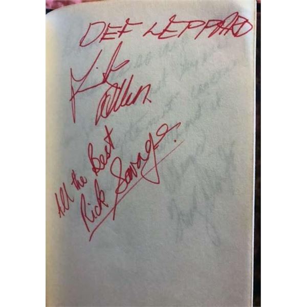 Def Leppard autographs of Rick Savage and Rick Allen