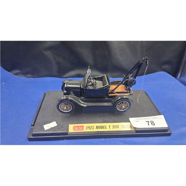 Vintage die cast Model T tow truck by Sunstar, base is 10"