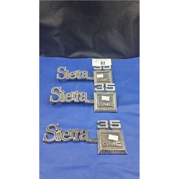 3 vintage Sierra GMC truck badges