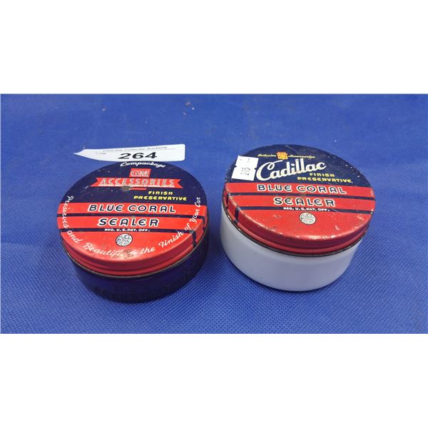 Pair of blue coral sealer tins