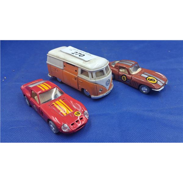 Vintage die cast Volkswagen bus 5" and 2 die cast race cars