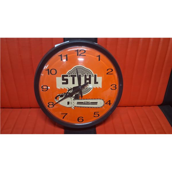 Vintage Stihl shop clock, 15" dia