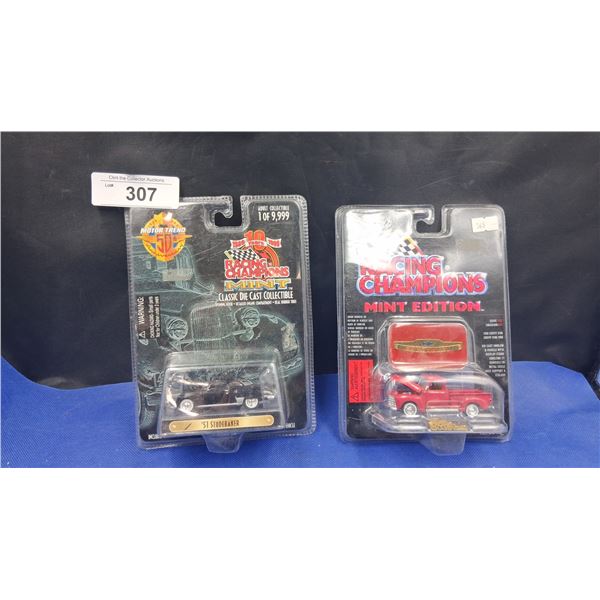 2 NIB collectable cars