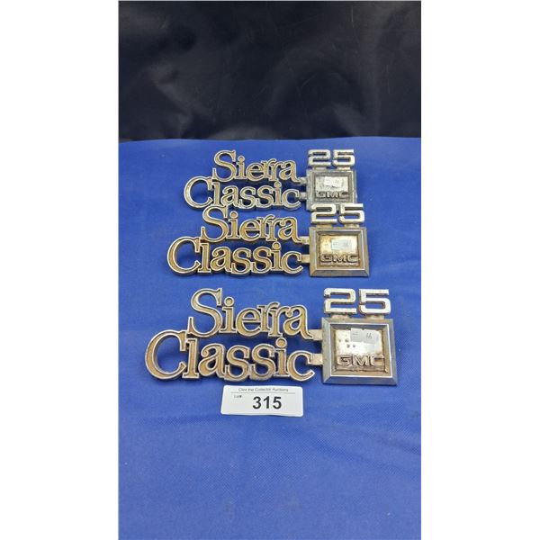 3 vintage truck emblems