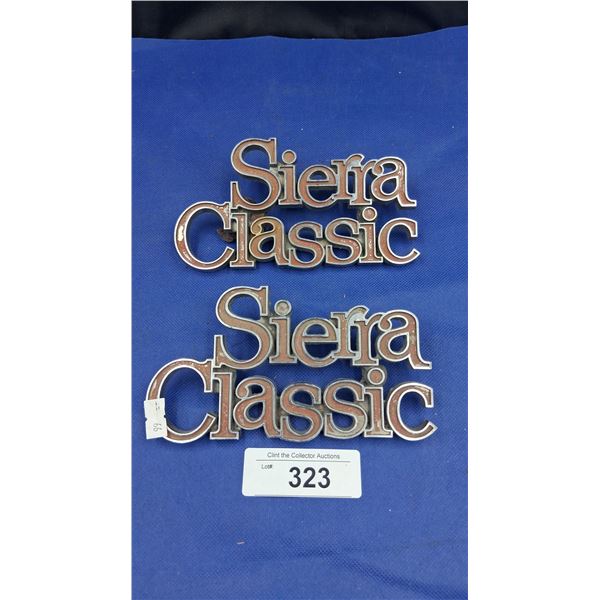 2 vintage truck emblems