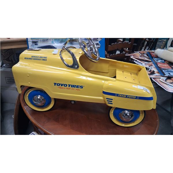 Vintage Toyo Tires steel pedal car 35" long