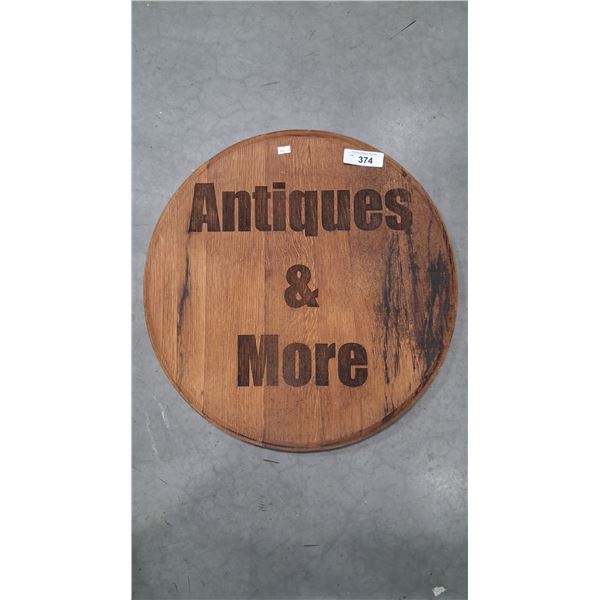 Vintage wooden "Antiques" sign 20" dia