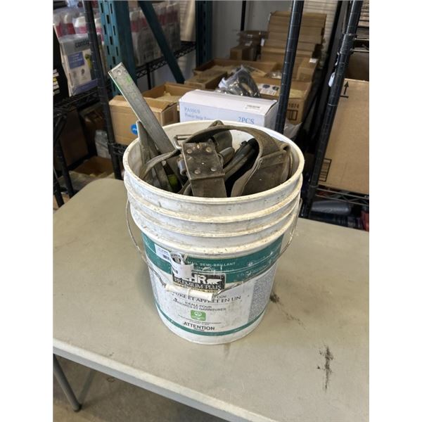 BUCKET OF VARIOUS CLAMPS AND A UTILITY BELT