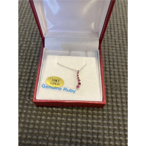 10KT WHITE GOLD NATURAL ENHANCED RUBY PENDANT WITH STERLING SILVER CHAIN , RETAIL $650.00.