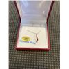 Image 1 : 10KT WHITE GOLD NATURAL ENHANCED RUBY PENDANT WITH STERLING SILVER CHAIN , RETAIL $650.00.