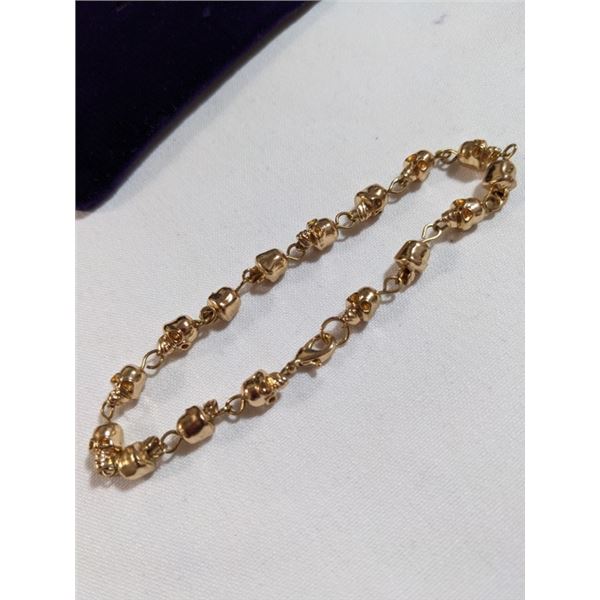 GOLD TONE HEAVY SKULL BEADS BRACELET