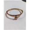 Image 1 : MICHAEL KORS GOLD TONE HINGED BANGLE, W/ PAD LOCK CHARM