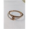 Image 2 : MICHAEL KORS GOLD TONE HINGED BANGLE, W/ PAD LOCK CHARM
