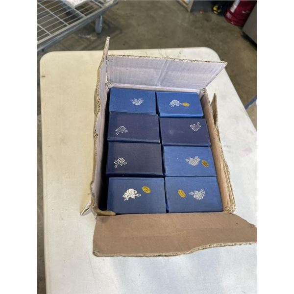 CRATE OF CRYSTAL PAPERWEIGHTS. LASER ETCHED