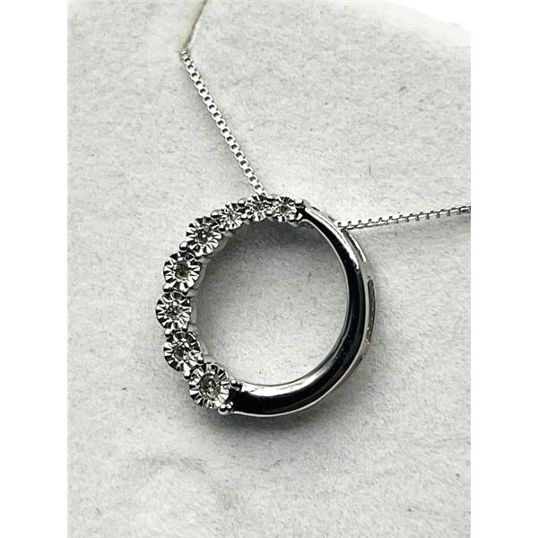 STERLING SILVER NATURAL DIAMOND (0.11CT) CIRCLE PENDANT WITH STERLING SILVER CHAIN, RETAIL $500.00. 