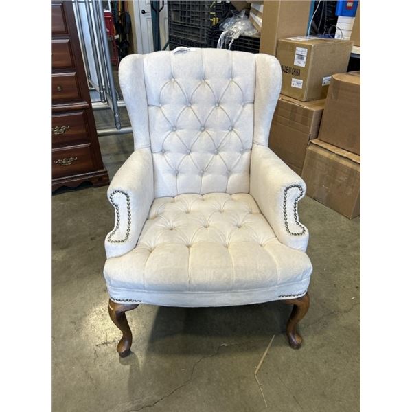 WINGBACK CHAIR WITH BRASS NAILHEAD ACCENT