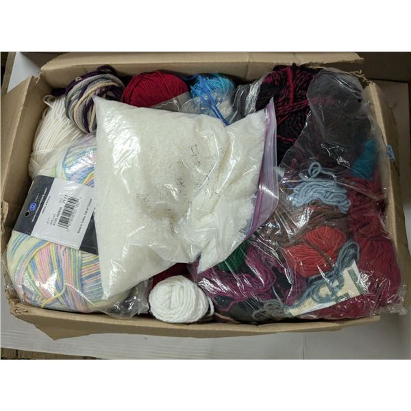 box of yarn with bag of plastic beads for dolls or bean bags