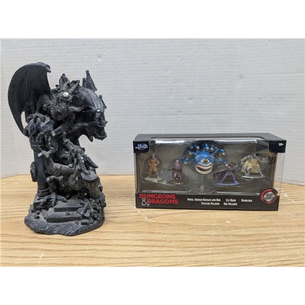 Dragon statue and D&D figurines