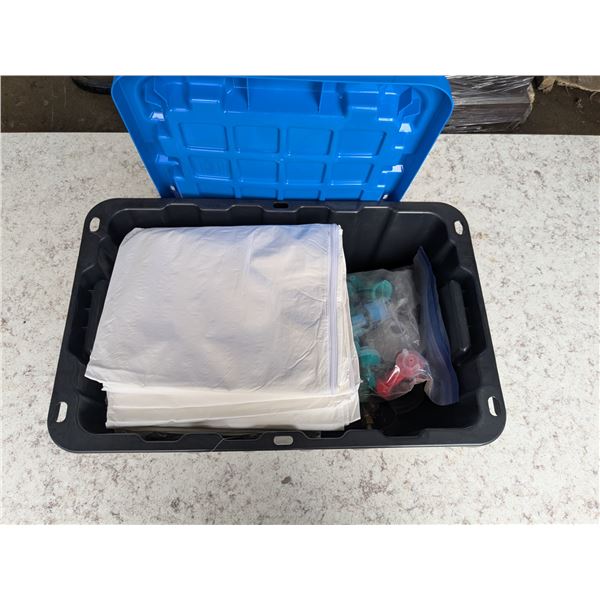 bin of painter tools, disposable coveralls, sprayer tips, mixing cups, sanding gear