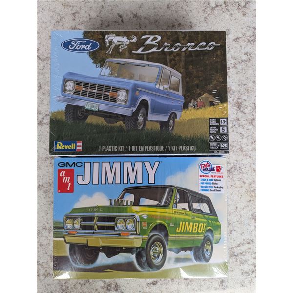 Ford bronco and GMC jimmy model cars- 2 in 1 - scale 1-25- sealed in box