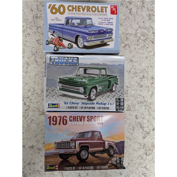 1960 chevy fleetside, 1965 stepside 2in 1 and 1976 sport stepside model trucks- 1-25- new in box