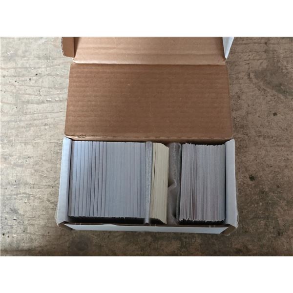 Box of various sport cards and star trek cards