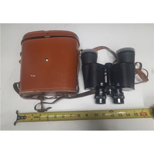 Vintage binoculars are branded as Eaton's Majestic with coated optics.