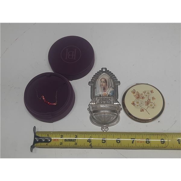 A vintage 1950s "JHS" holy water font featuring a portrait of the Virgin Mary, Vintage Stratton powd