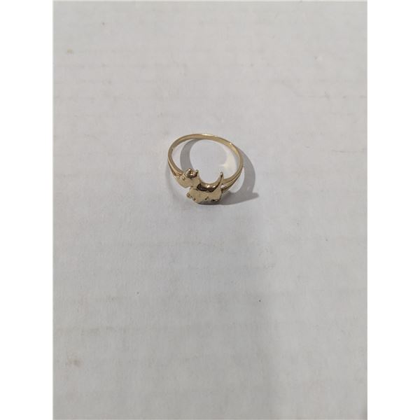 gold tone dog ring, stamped "10k"