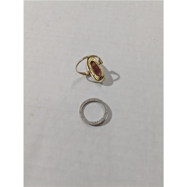 2 gold tone rings