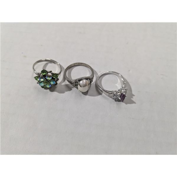 3 silver tone rings