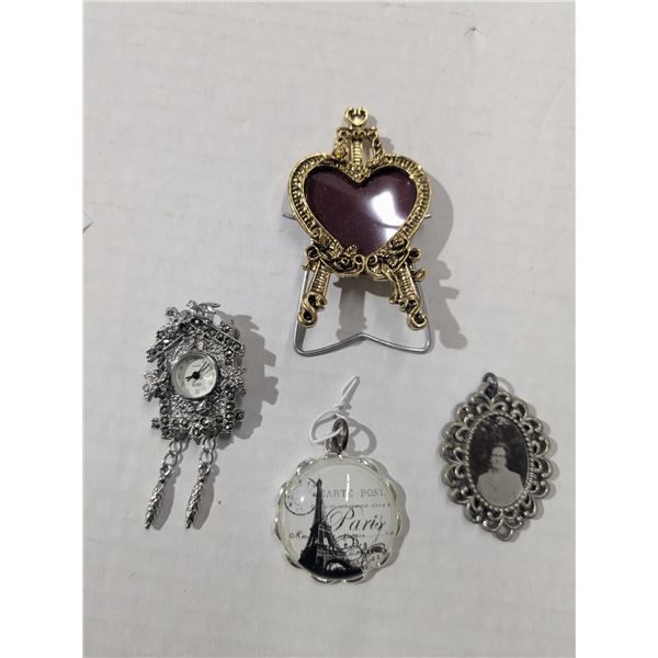 2 pendants, 1 clock brooch, 1 photo stand