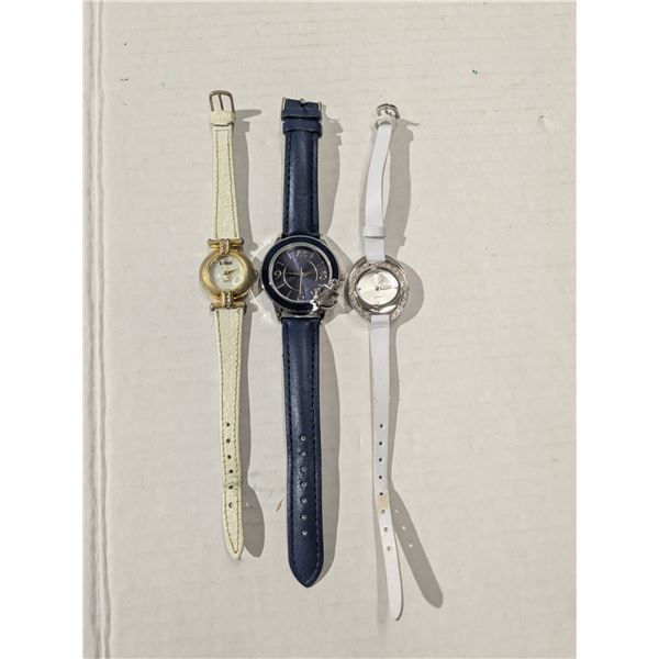 3 watches with leather straps