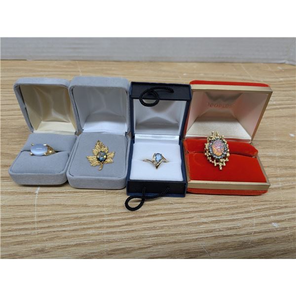 3 gold tone rings, one pin
