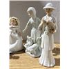 Image 2 : (2) large ceramic female statues, (2) small ceramic statues, (1) small doll on a stand
