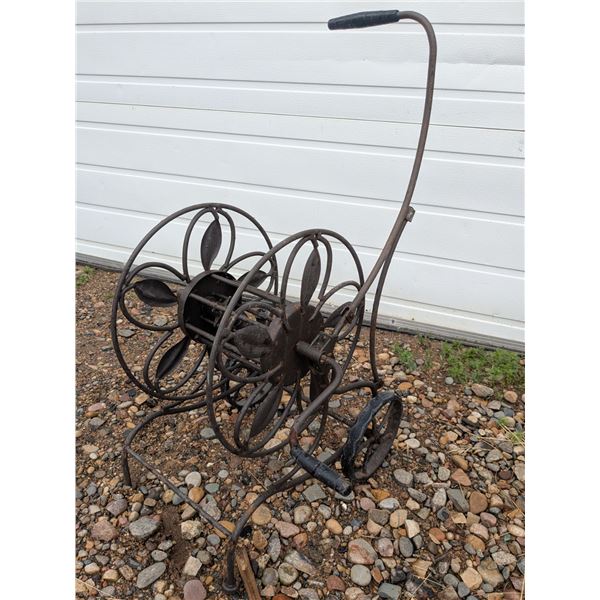 Vintage hose reel, wrought iron